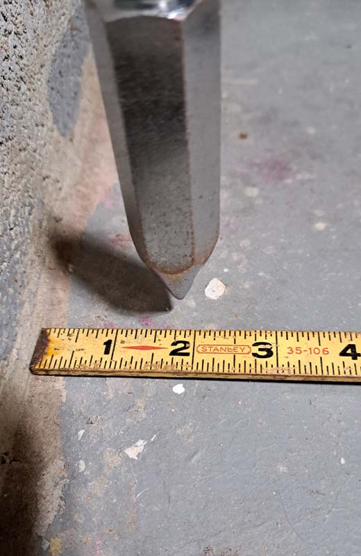Plumb bob measurement of foundation wall